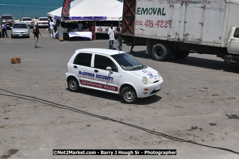 Lucea Cross the Harbour @ Lucea Car Park - All Day Event - Cross the Harbour Swim, Boat Rides, and Entertainment for the Family - Concert Featuring: Bushman, George Nooksl, Little Hero, Bushi One String, Dog Rice and many local Artists - Friday, August 1, 2008 - Lucea, Hanover Jamaica - Photographs by Net2Market.com - Barry J. Hough Sr. Photojournalist/Photograper - Photographs taken with a Nikon D300 - Negril Travel Guide, Negril Jamaica WI - http://www.negriltravelguide.com - info@negriltravelguide.com...!