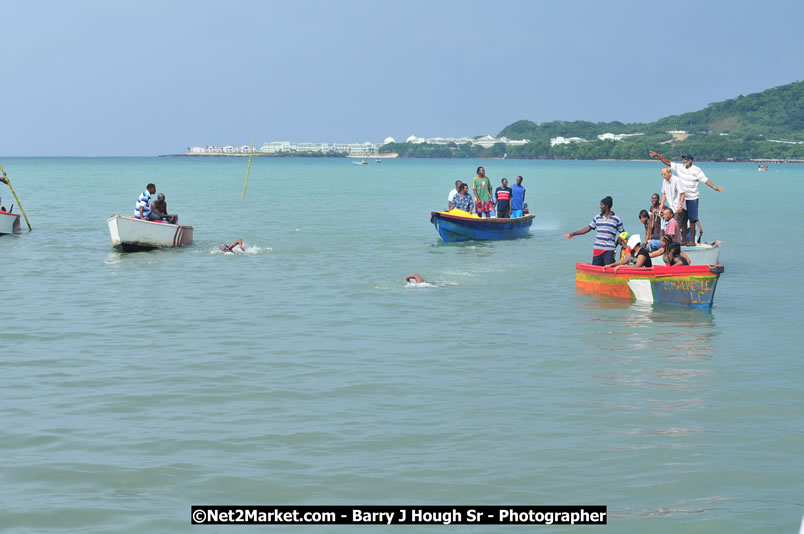 Lucea Cross the Harbour @ Lucea Car Park - All Day Event - Cross the Harbour Swim, Boat Rides, and Entertainment for the Family - Concert Featuring: Bushman, George Nooksl, Little Hero, Bushi One String, Dog Rice and many local Artists - Friday, August 1, 2008 - Lucea, Hanover Jamaica - Photographs by Net2Market.com - Barry J. Hough Sr. Photojournalist/Photograper - Photographs taken with a Nikon D300 - Negril Travel Guide, Negril Jamaica WI - http://www.negriltravelguide.com - info@negriltravelguide.com...!