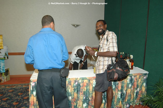 Red Cap Porters Awards - Minister of Tourism, Hon. Edmund Bartlett - Director of Tourism, Basil Smith - Friday, December 14, 2007 - Holiday Inn Sunspree, Montego Bay, Jamaica W.I. - Photographs by Net2Market.com - Barry J. Hough Sr, Photographer - Negril Travel Guide, Negril Jamaica WI - http://www.negriltravelguide.com - info@negriltravelguide.com...!