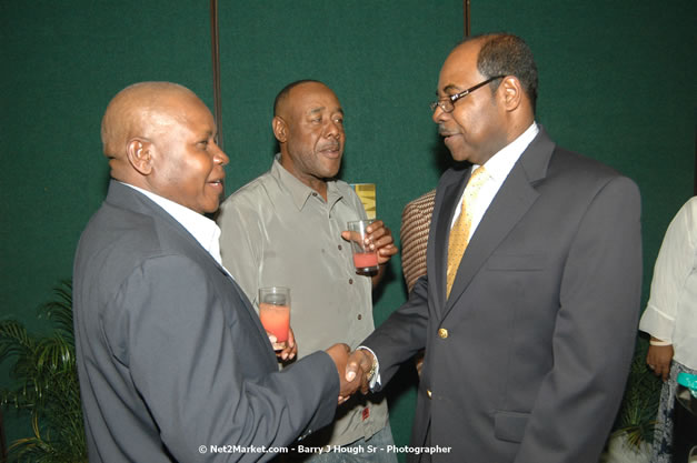 Red Cap Porters Awards - Minister of Tourism, Hon. Edmund Bartlett - Director of Tourism, Basil Smith - Friday, December 14, 2007 - Holiday Inn Sunspree, Montego Bay, Jamaica W.I. - Photographs by Net2Market.com - Barry J. Hough Sr, Photographer - Negril Travel Guide, Negril Jamaica WI - http://www.negriltravelguide.com - info@negriltravelguide.com...!