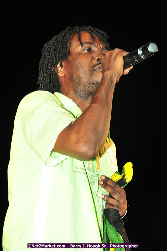 Usain Bolt of Jamaica - The Fastest Man In The World  - Usain Bolt Homecoming Celebrations Concert at the William Knibb High School Play Field, Trelawny - Ice, Ding Dong, Ravers Clavers, D'Angel, Voicemail, RDX and Dancers, Wayne Marshall, Tammi Chynn, Bugle, Nero, Tanya Stephens, Richie Spice, Kip Rich,and Shaggy - Photographs by Net2Market.com - Barry J. Hough Sr. Photojournalist/Photograper - Photographs taken with a Nikon D300 - Negril Travel Guide, Negril Jamaica WI - http://www.negriltravelguide.com - info@negriltravelguide.com...!