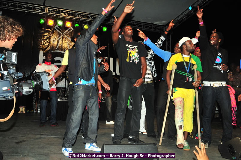 Usain Bolt of Jamaica - The Fastest Man In The World  - Usain Bolt Homecoming Celebrations Concert at the William Knibb High School Play Field, Trelawny - Ice, Ding Dong, Ravers Clavers, D'Angel, Voicemail, RDX and Dancers, Wayne Marshall, Tammi Chynn, Bugle, Nero, Tanya Stephens, Richie Spice, Kip Rich,and Shaggy - Photographs by Net2Market.com - Barry J. Hough Sr. Photojournalist/Photograper - Photographs taken with a Nikon D300 - Negril Travel Guide, Negril Jamaica WI - http://www.negriltravelguide.com - info@negriltravelguide.com...!