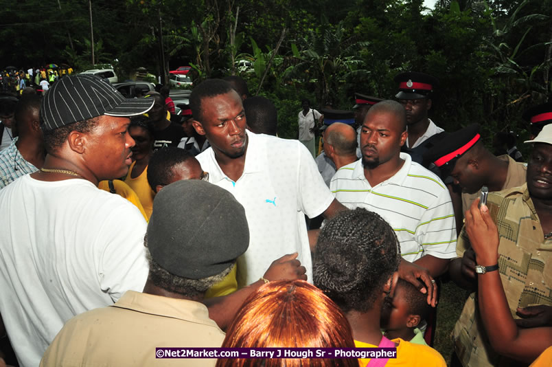 Usain Bolt of Jamaica - The Fastest Man In The World  - Usain Bolt Homecoming Celebrations - Press Conference at the Grand Bahia Principe &amp; Sherwood Content - Waldensia Primary School - Photographs by Net2Market.com - Barry J. Hough Sr. Photojournalist/Photograper - Photographs taken with a Nikon D300 - Negril Travel Guide, Negril Jamaica WI - http://www.negriltravelguide.com - info@negriltravelguide.com...!